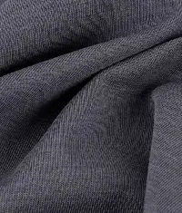A close up image of a grey colour jersey fabric roll