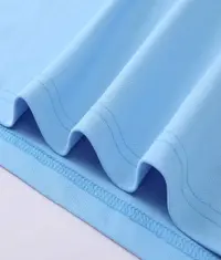 A close up photo of the high quality seams and finish of a Polo T shirt