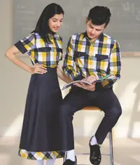 Boy wearing school uniform trousers