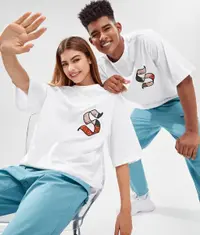 A couple wearing trendy t shirts