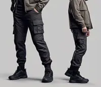 A couple of people wearing black colour streetwear style cargo pants
