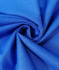 A close up image of a royal blue colour tencel knit fabric